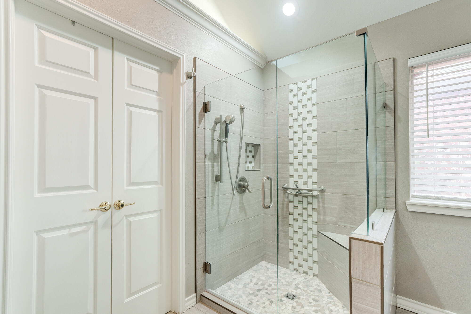 6908 Freeport Avenue Lubbock, TX 79424 - Photo 27 of 44 a bathroom with a shower