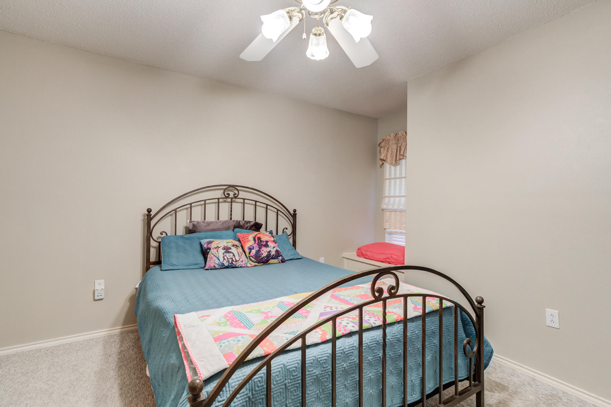 6908 Freeport Avenue Lubbock, TX 79424 - Photo 35 of 44 a bedroom with a bed and window