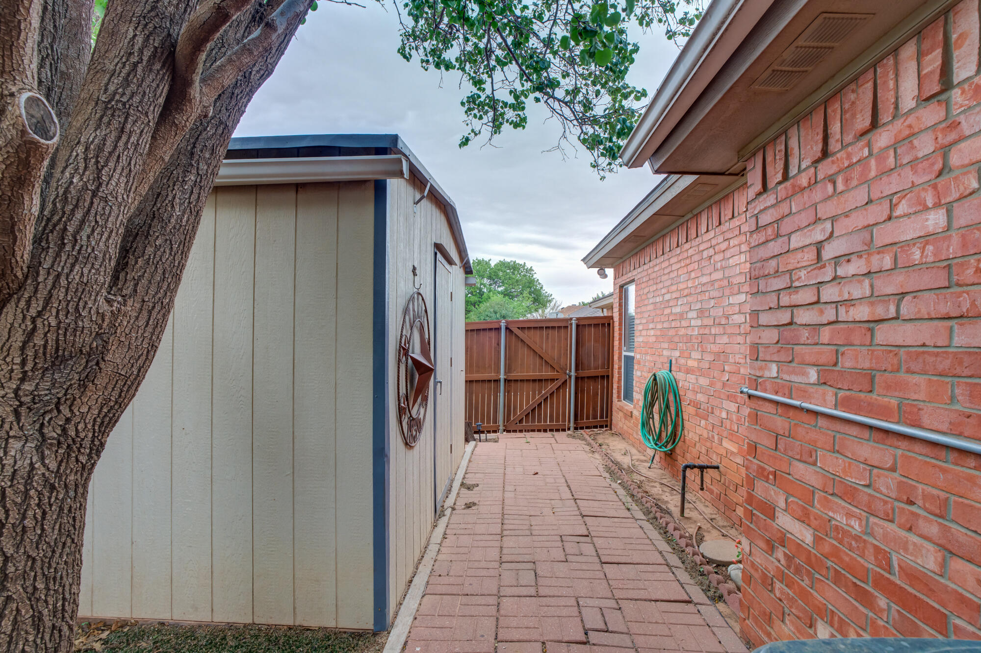 6908 Freeport Avenue Lubbock, TX 79424 - Photo 42 of 44 a view of a pathway of a building