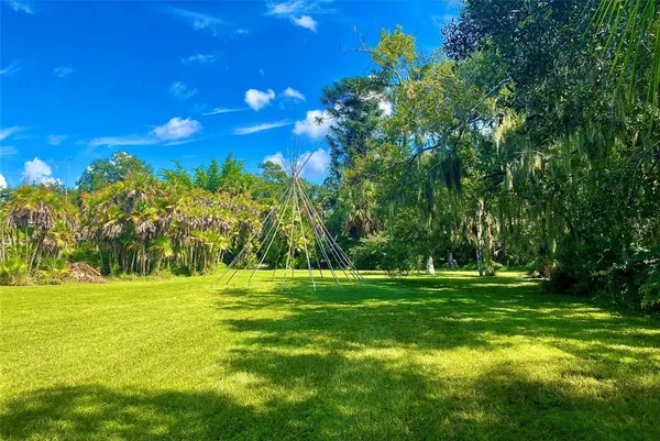 a view of a golf course with a trees