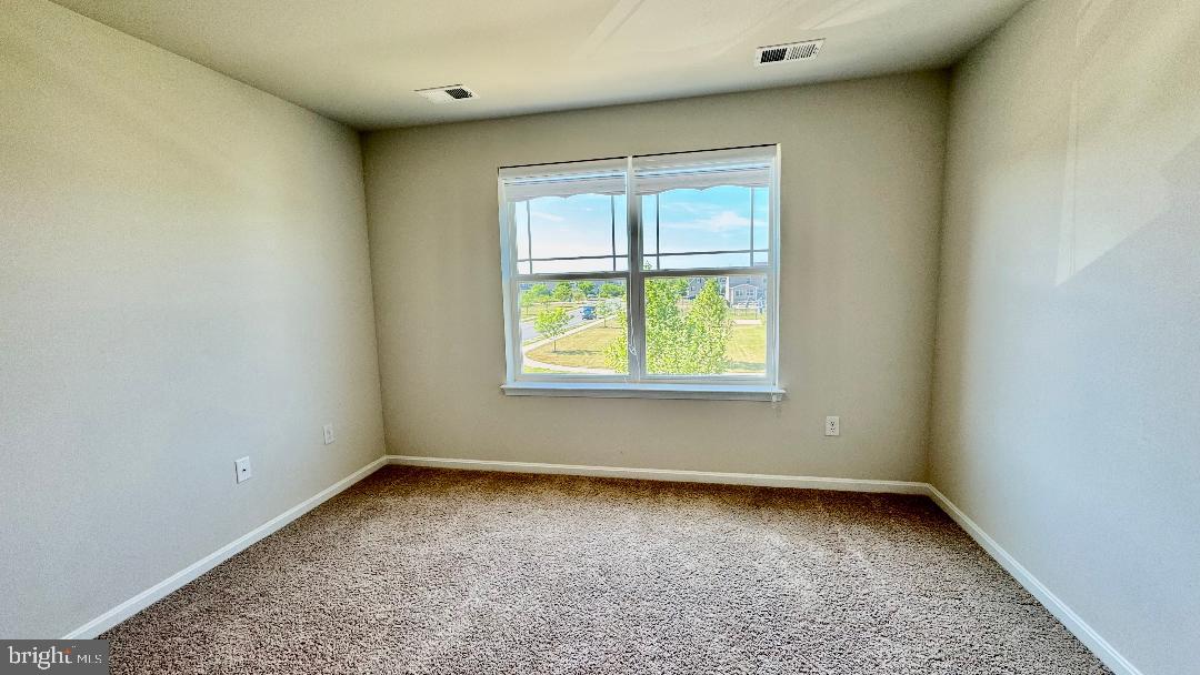 1236 Pimpernell Path Middletown, DE 19709 - Photo 28 of 37 an empty room with a window
