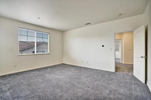 a bathroom with a sink vanity and a mirror