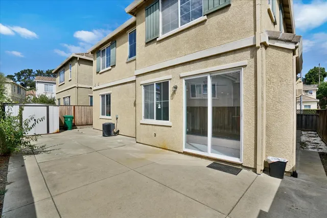 a view of a terrace with sitting area