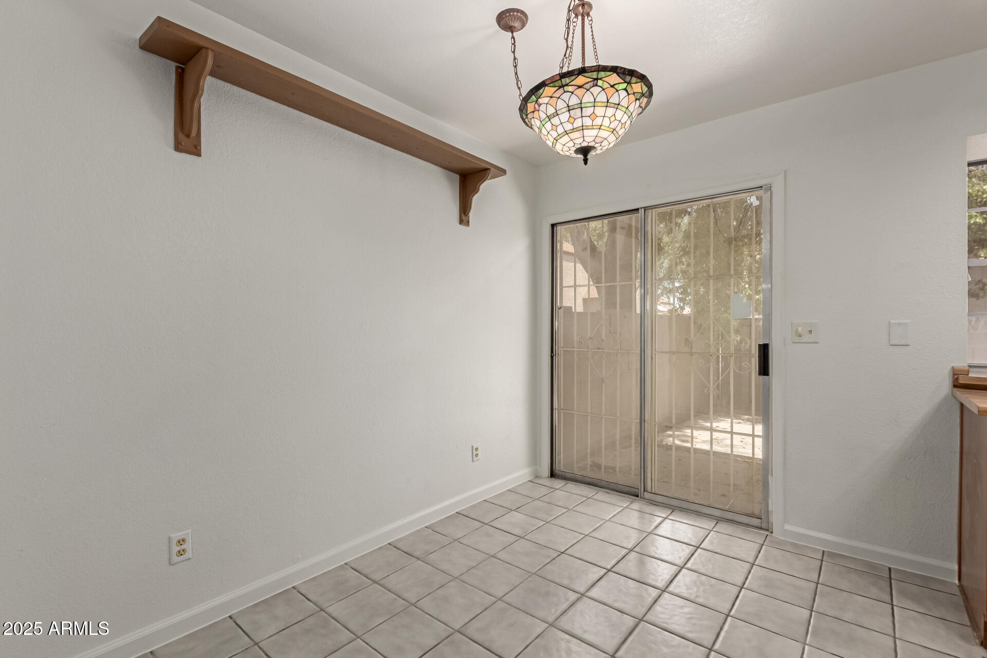 7977 West Wacker Road, Unit 244 Peoria, AZ 85381 - Photo 11 of 34 a view of an entryway with wooden floor