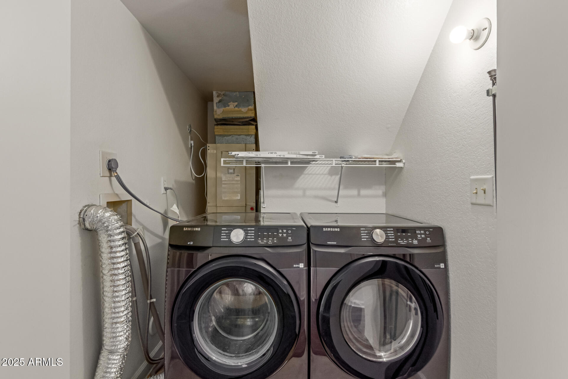 7977 West Wacker Road, Unit 244 Peoria, AZ 85381 - Photo 13 of 34 a utility room with dryer and washer