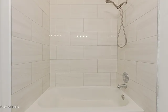a bathroom with a sink mirror vanity and toilet