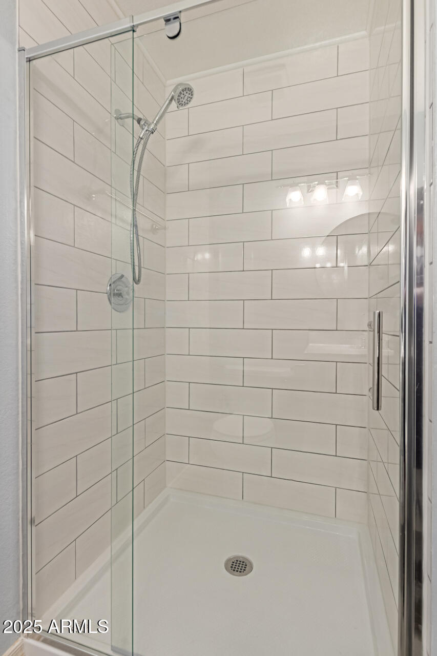 7977 West Wacker Road, Unit 244 Peoria, AZ 85381 - Photo 23 of 34 a bathroom with a shower