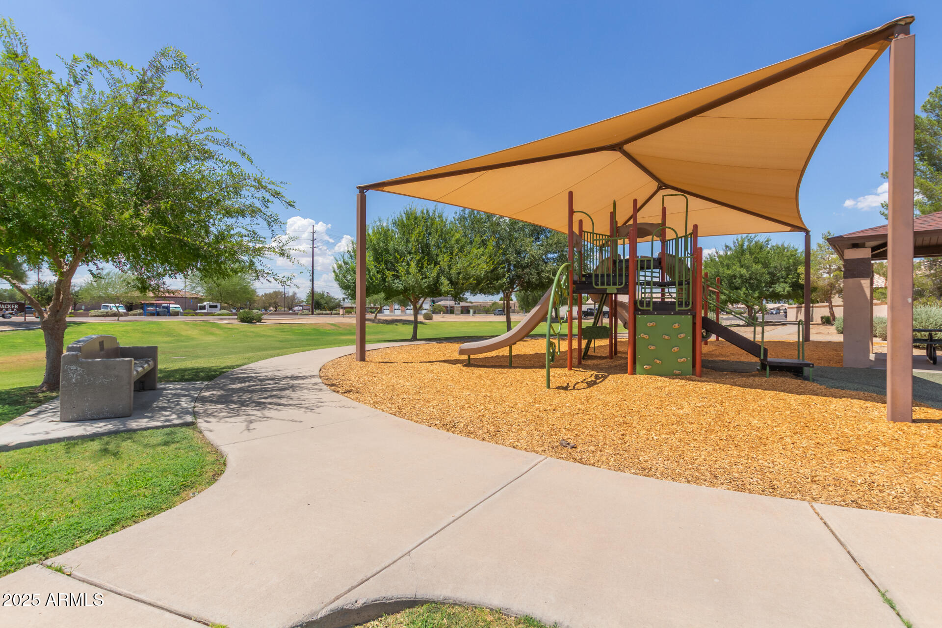 7977 West Wacker Road, Unit 244 Peoria, AZ 85381 - Photo 31 of 34 a view of a backyard with a patio