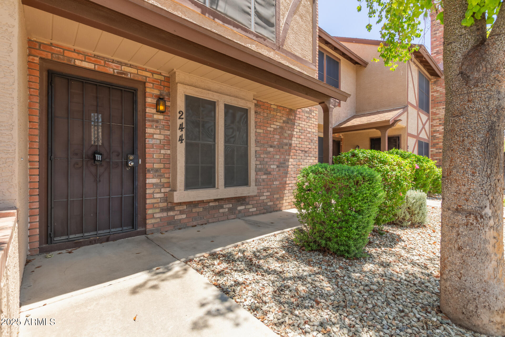 7977 West Wacker Road, Unit 244 Peoria, AZ 85381 - Photo 3 of 34 a view of a entrance of the house