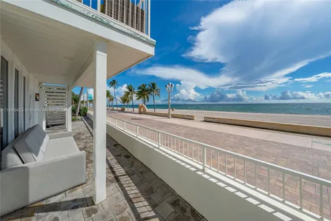 a view of a living room with a balcony