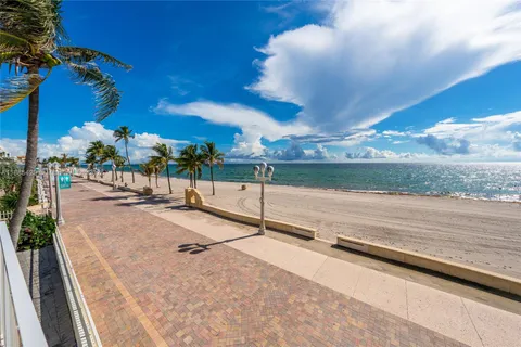 a view of a city with an ocean view