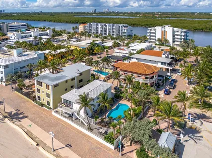 a view of a balcony with chairs