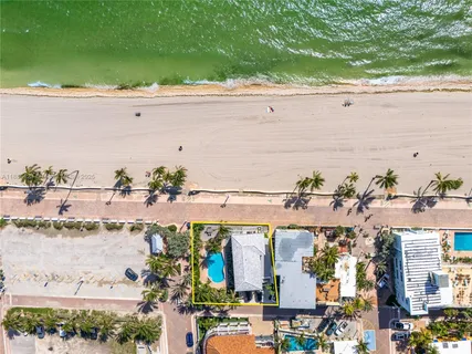 a view of a street with a building in the background