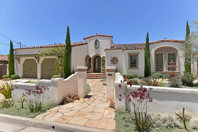 a front view of a house with a porch