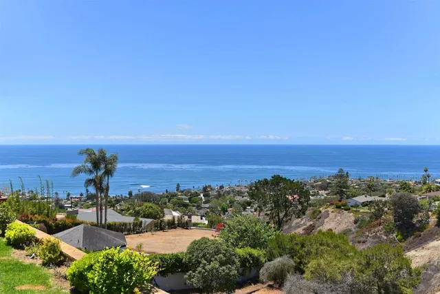 a view of a city with ocean
