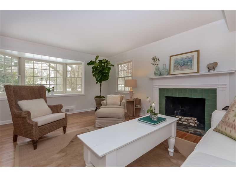 154 Middlesex Road Darien, CT 06820 - Photo 4 of 20 a living room with furniture and a fireplace