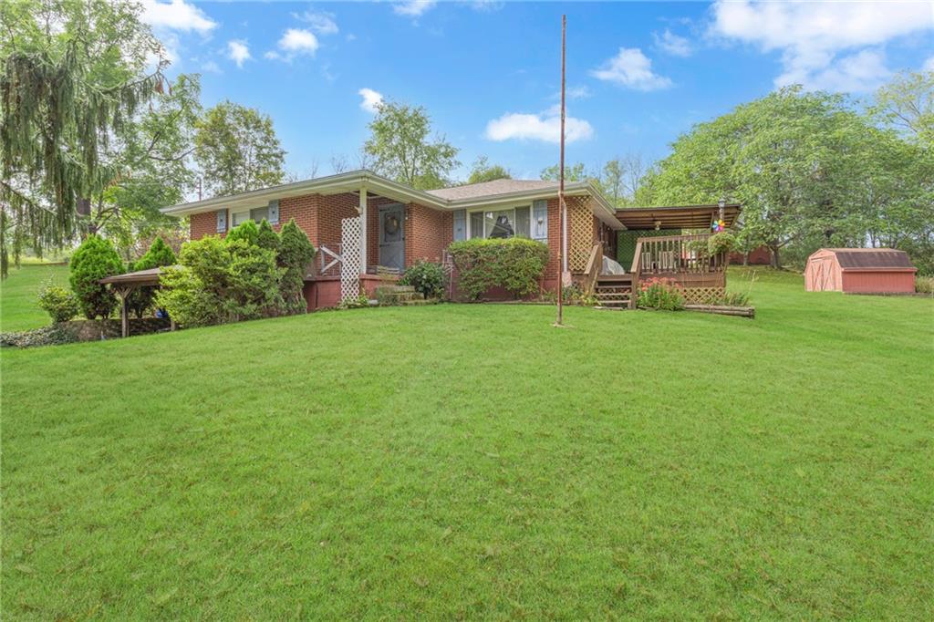 136 Kelley Road Industry, PA 15052 - Photo 1 of 35 a view of a house with a backyard