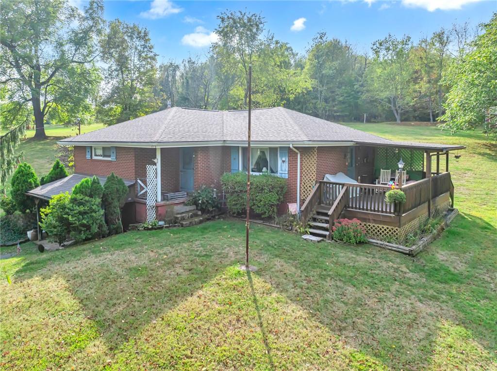 136 Kelley Road Industry, PA 15052 - Photo 17 of 35 a house view with a sitting space and garden