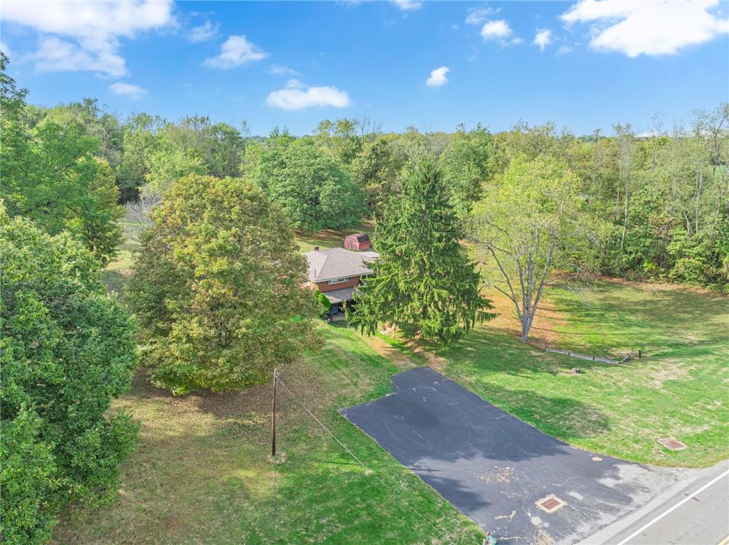 136 Kelley Road Industry, PA 15052 - Photo 24 of 35 a view of a yard with a tree