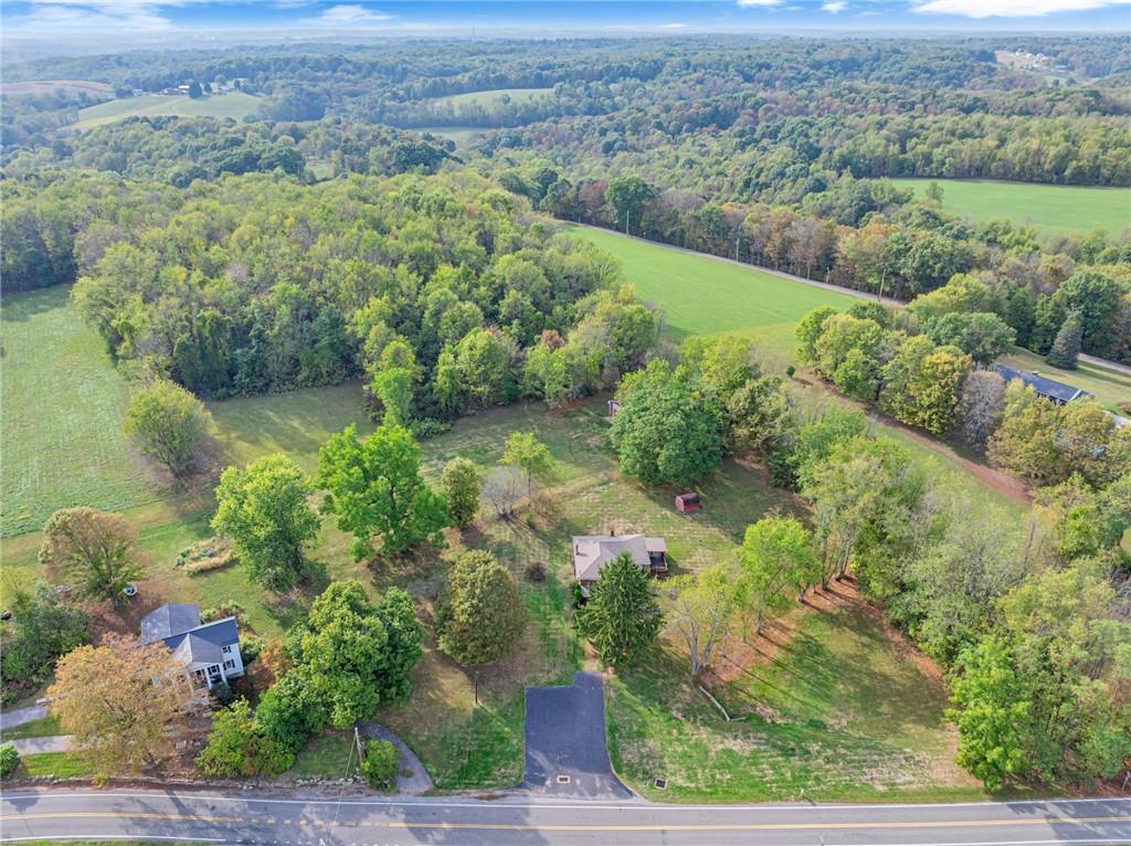 136 Kelley Road Industry, PA 15052 - Photo 25 of 35 an aerial view of a house with a yard