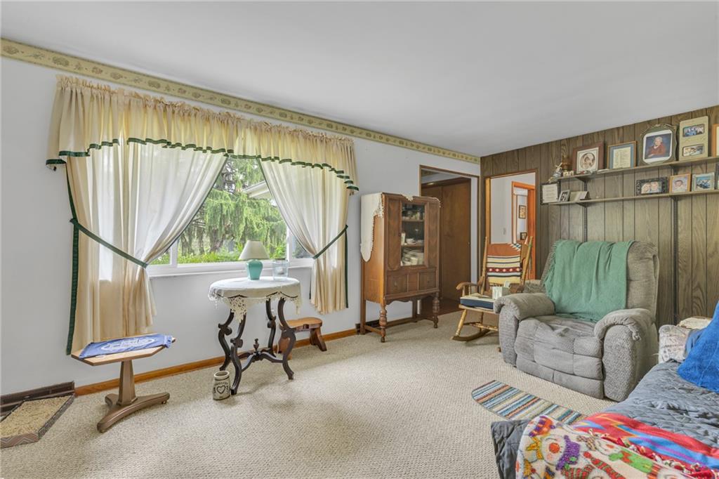 136 Kelley Road Industry, PA 15052 - Photo 5 of 35 a living room with furniture a window and a table