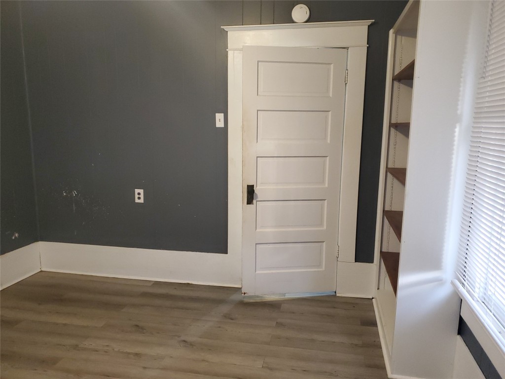 1233 Caldwell Road Angleton, TX 77515 - Photo 23 of 32 a view of an empty walk in closet