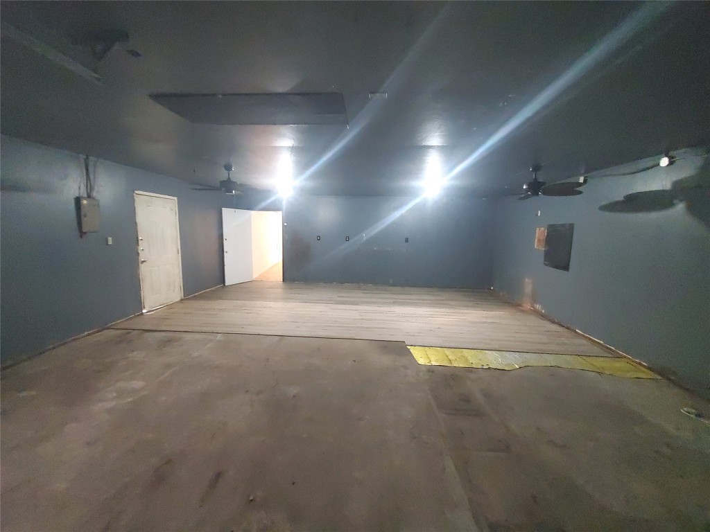 1233 Caldwell Road Angleton, TX 77515 - Photo 29 of 32 an empty room with windows