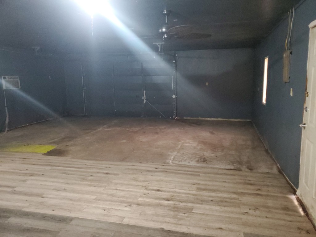 1233 Caldwell Road Angleton, TX 77515 - Photo 30 of 32 a view of a room with wooden floor