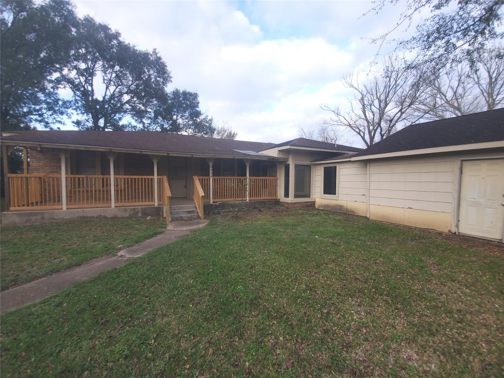 1233 Caldwell Road Angleton, TX 77515 - Photo 3 of 32 a view of a house with a backyard