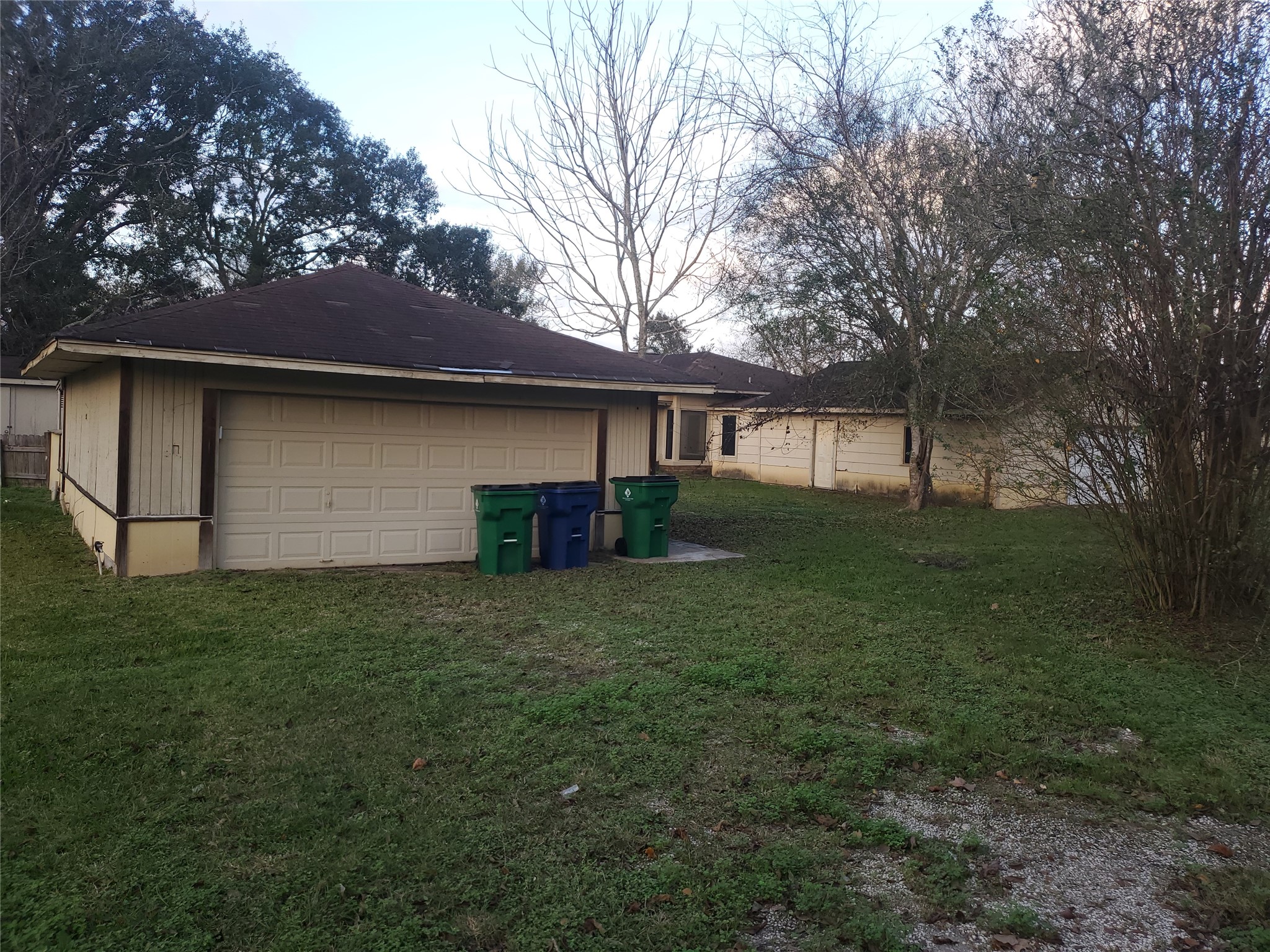 1233 Caldwell Road Angleton, TX 77515 - Photo 7 of 32 a house view with backyard space