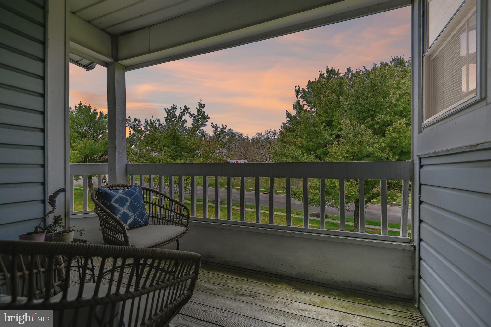 8369 Montgomery Run Road, Unit J Ellicott City, MD 21043 - Photo 11 of 40 ENJOY BEAUTIFUL SUNRISES & SUNSETS FROM THE PORCH