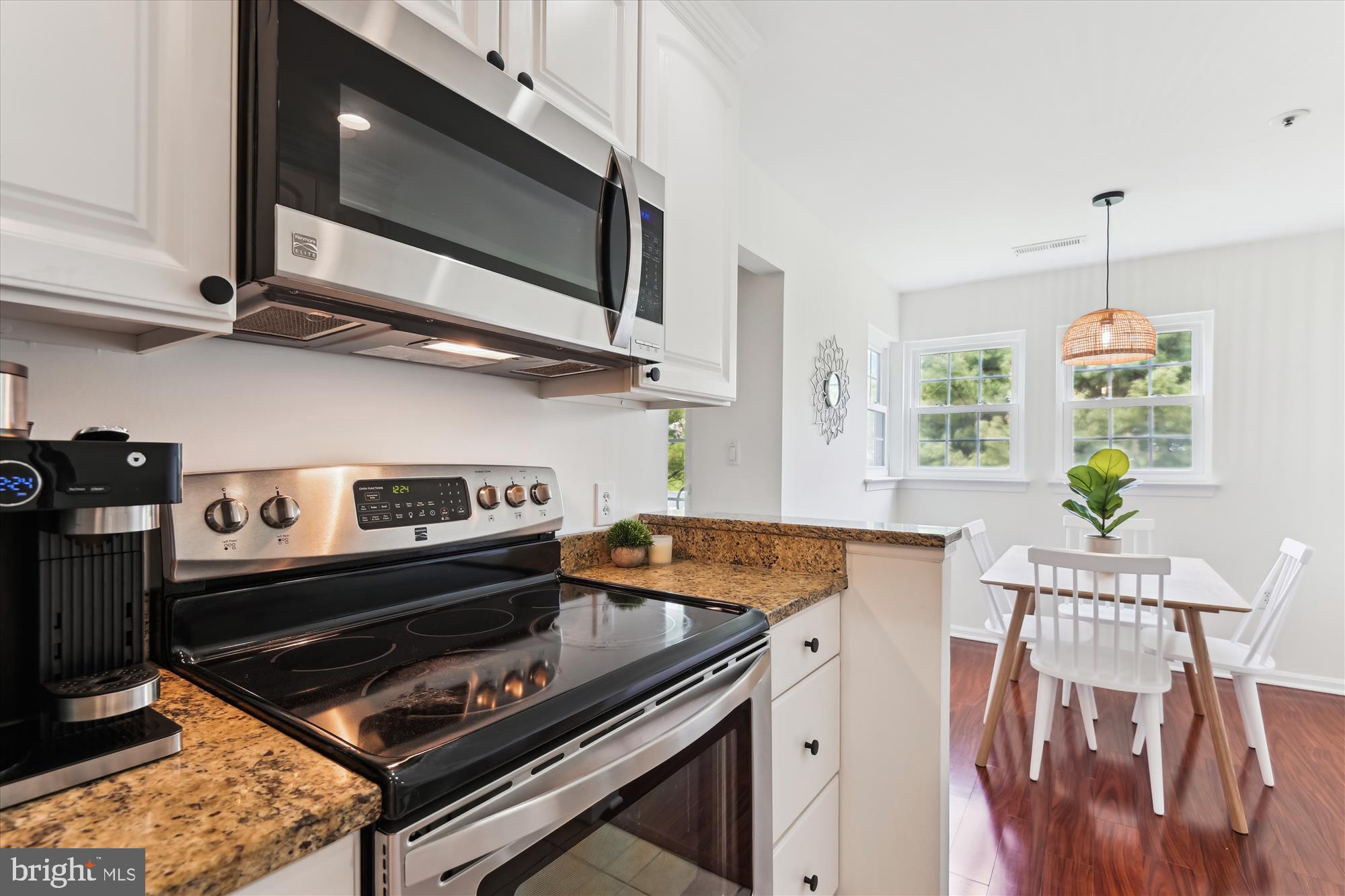 8369 Montgomery Run Road, Unit J Ellicott City, MD 21043 - Photo 17 of 40 ELECTRIC COOKING & STAINLESS STEEL APPLIANCES