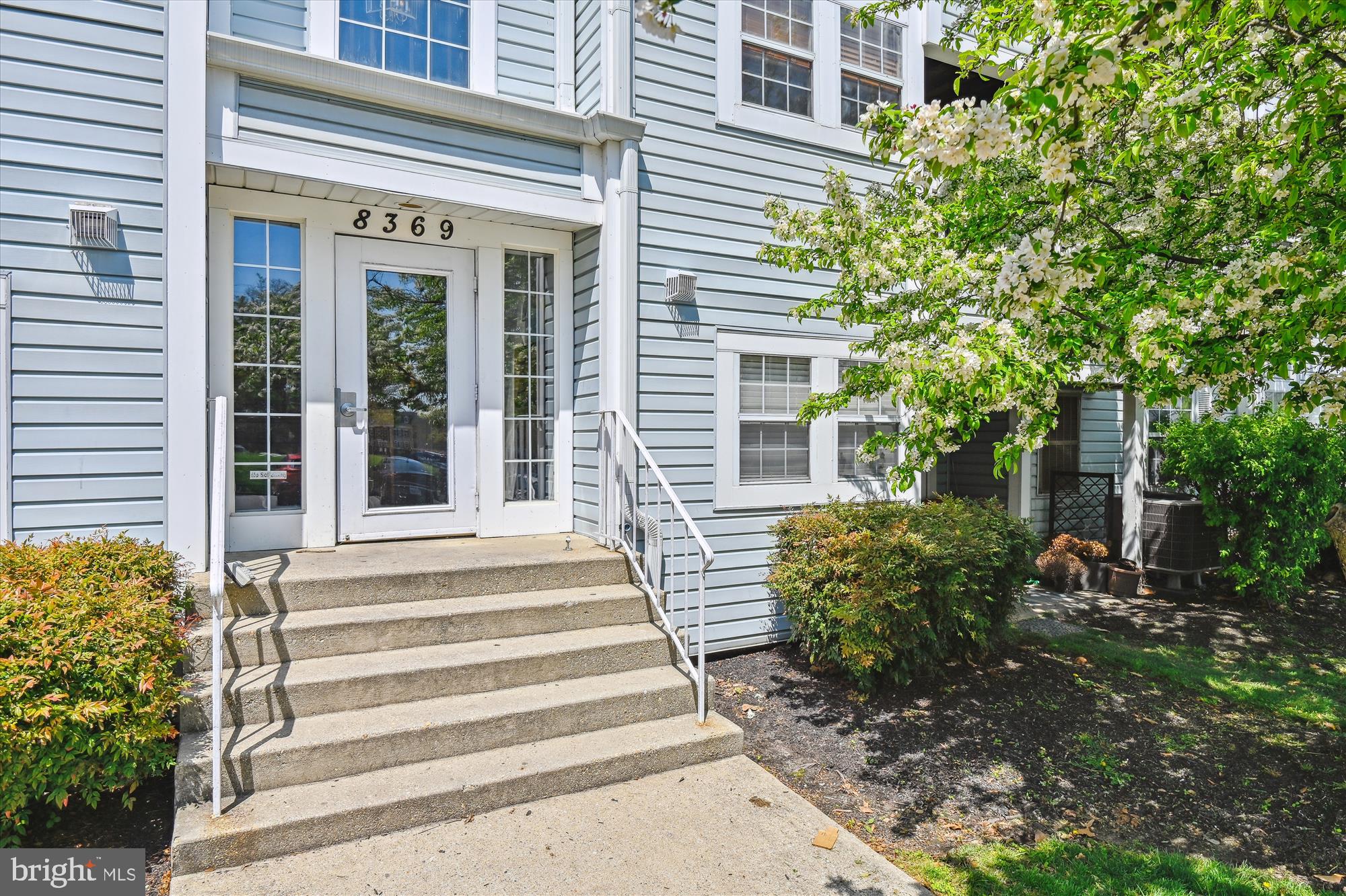 8369 Montgomery Run Road, Unit J Ellicott City, MD 21043 - Photo 2 of 40 WELCOMING BUILDING ENTRANCE