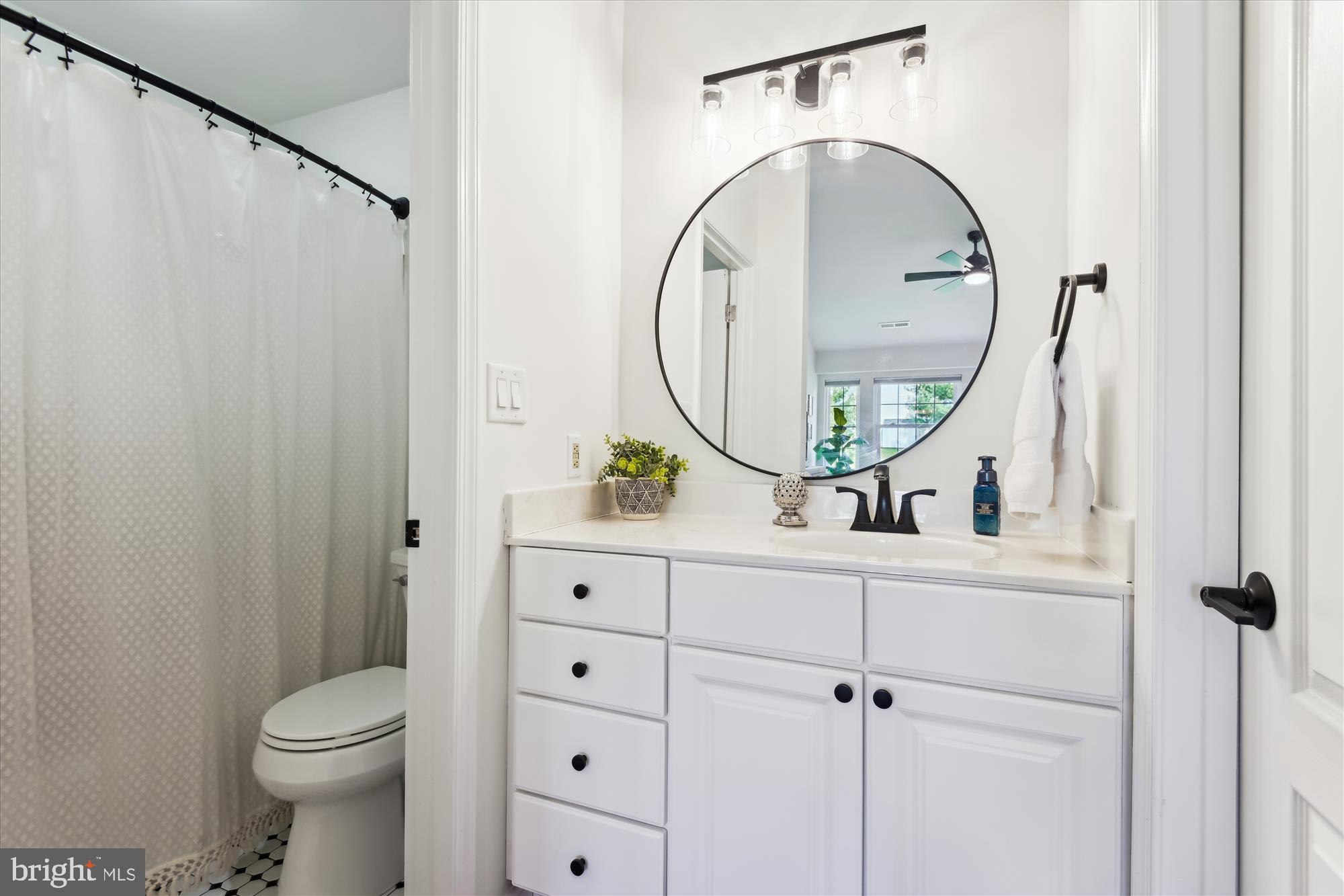 8369 Montgomery Run Road, Unit J Ellicott City, MD 21043 - Photo 25 of 40 WATER CLOSET & TUB SHOWER W/ SEPARATE MARBLE VAN.