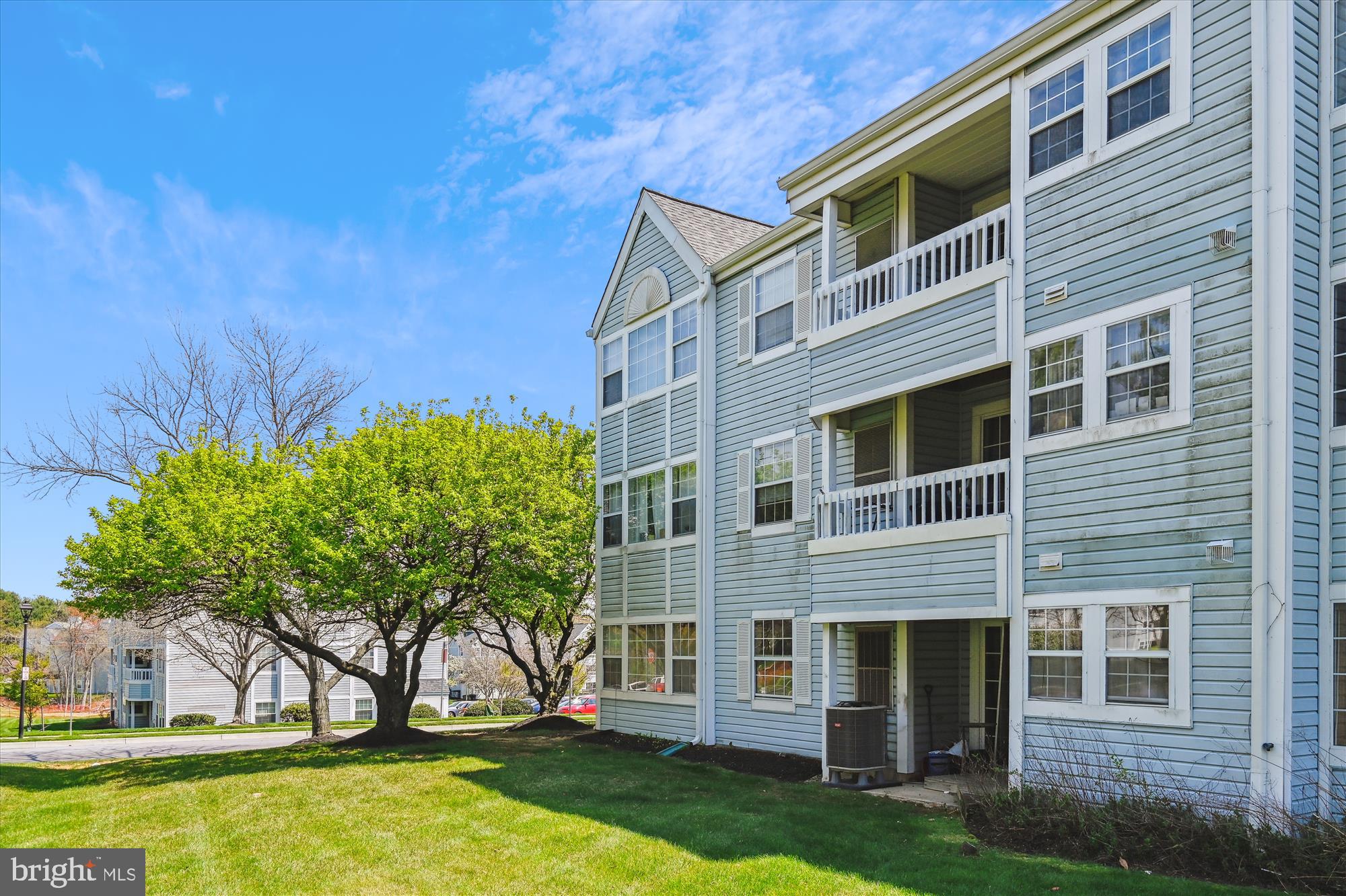 8369 Montgomery Run Road, Unit J Ellicott City, MD 21043 - Photo 32 of 40 VERDANT LAWN & MATURE TREES