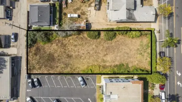 a view of building with yard
