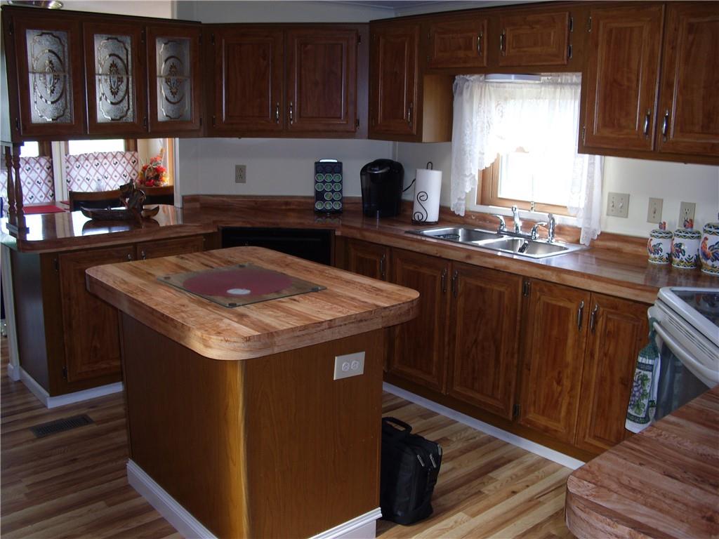 340 Deerfield Road Washington, PA 15301 - Photo 8 of 36 a kitchen with a sink and cabinets