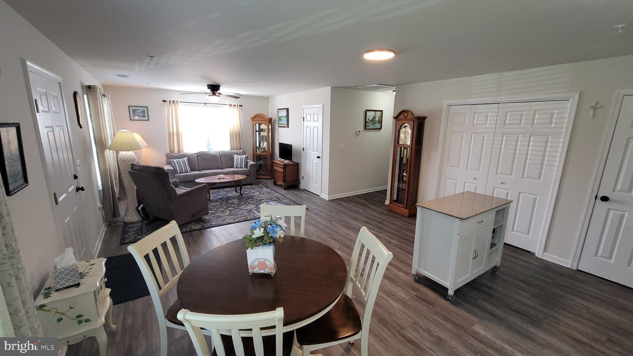 126 Metcalf Road Chestertown, MD 21620 - Photo 11 of 25 a view of a dining room with furniture window and wooden floor
