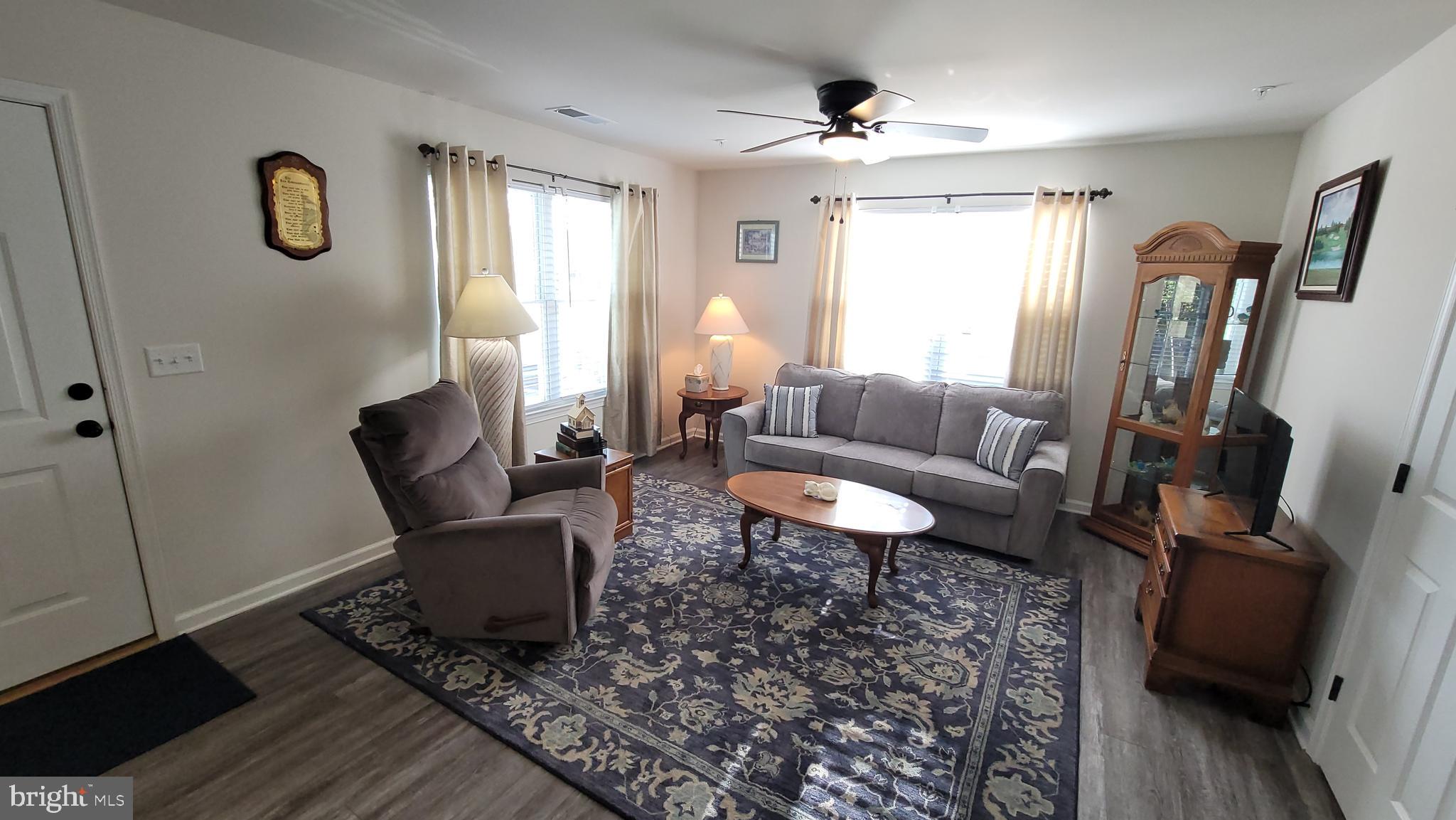 126 Metcalf Road Chestertown, MD 21620 - Photo 12 of 25 a living room with furniture a rug and a window