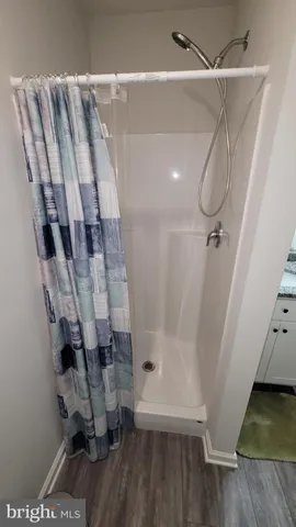 a view of entryway with wooden floor