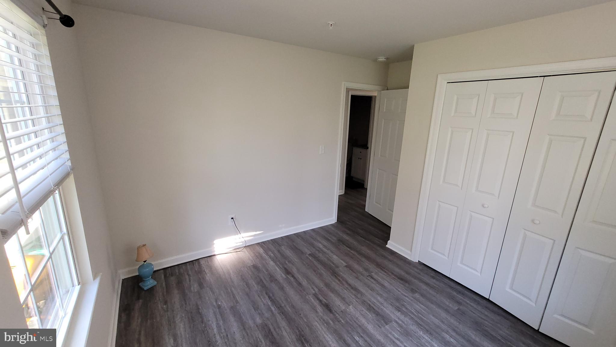 126 Metcalf Road Chestertown, MD 21620 - Photo 17 of 25 a view of an empty room with wooden floor and a window