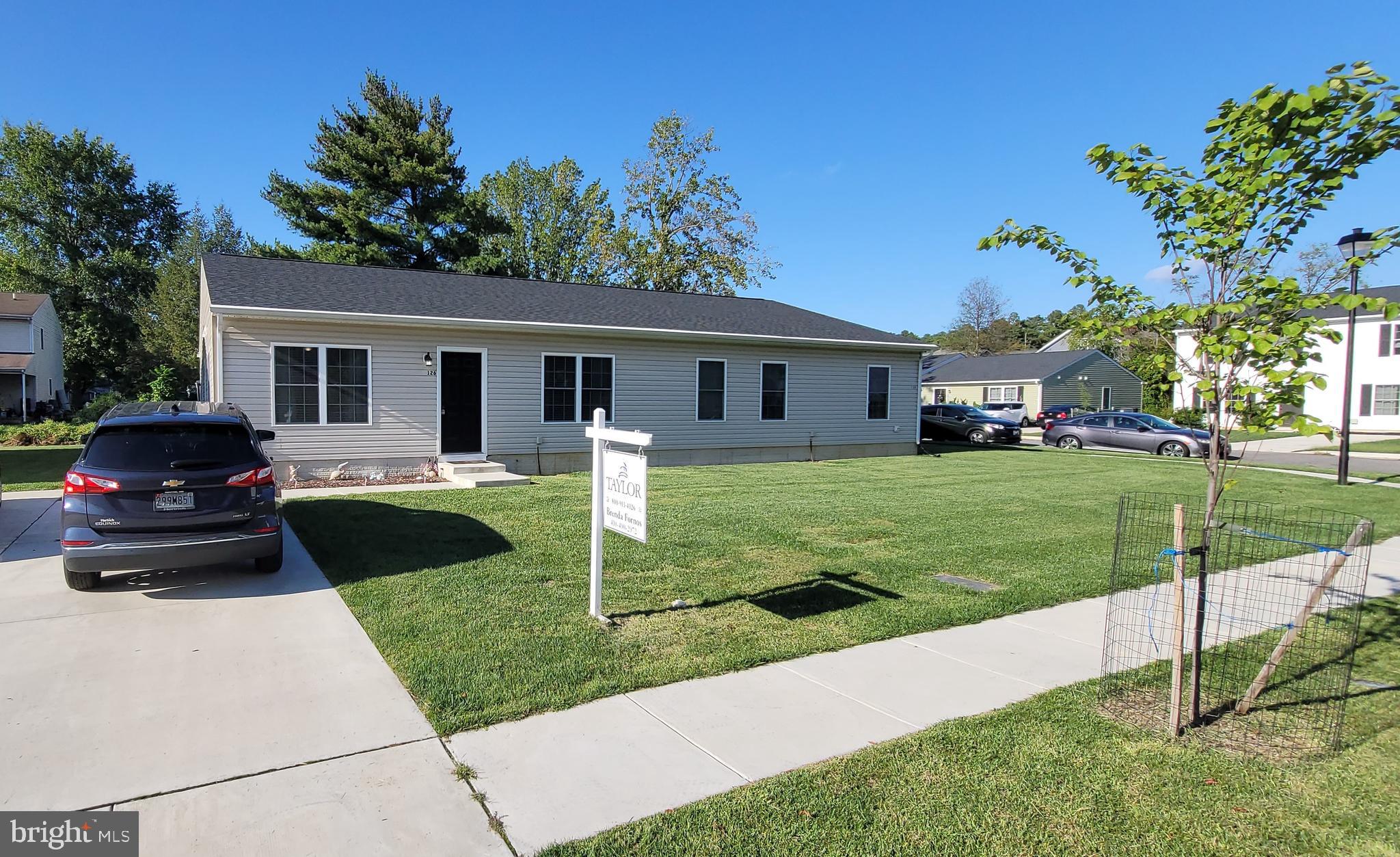 126 Metcalf Road Chestertown, MD 21620 - Photo 2 of 25 a front view of a house with garden