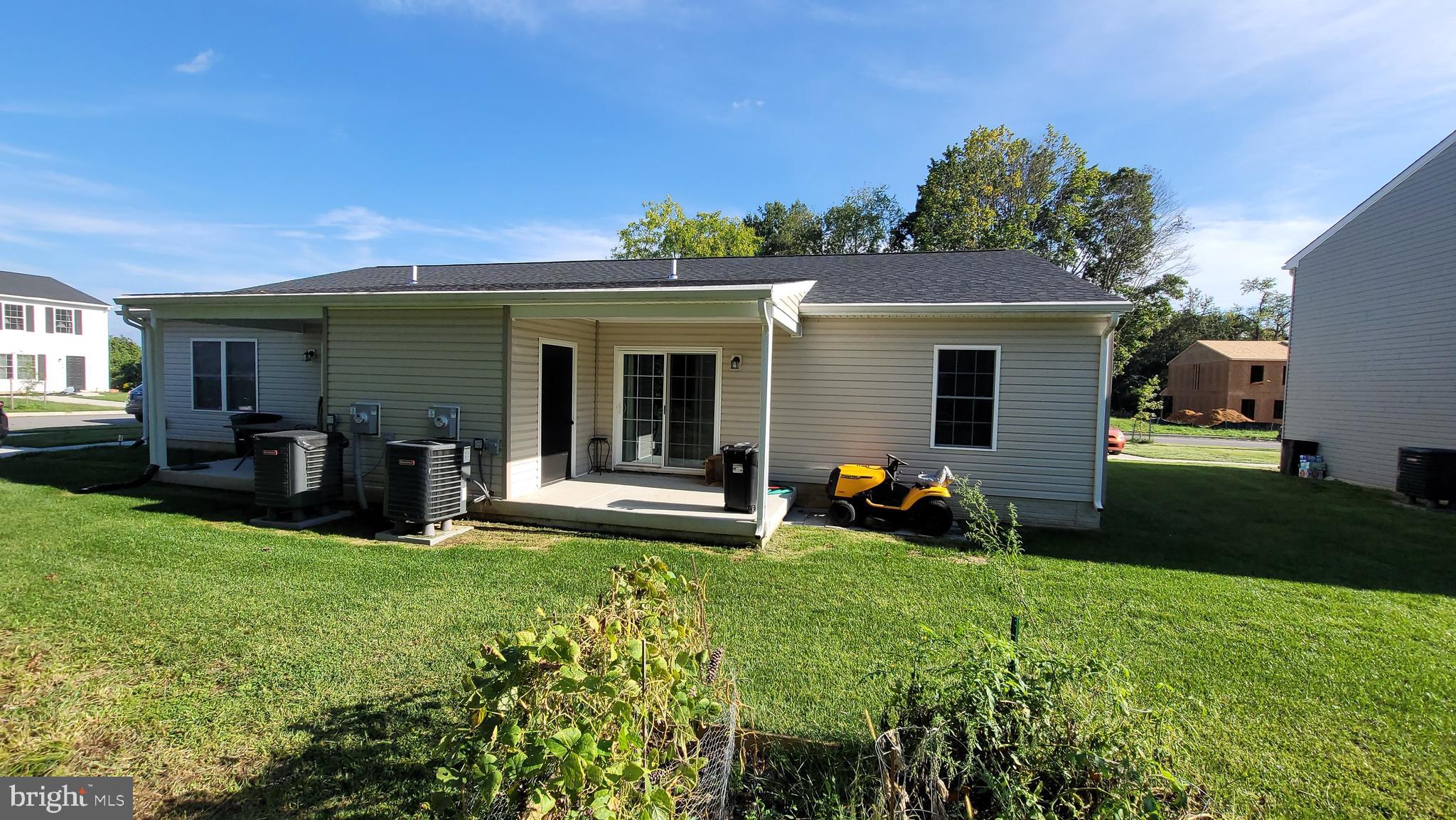 126 Metcalf Road Chestertown, MD 21620 - Photo 5 of 25 a front view of a house with patio and garden