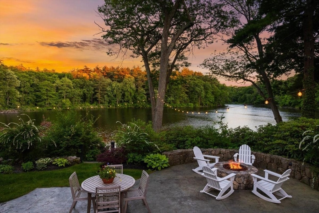 25 Howland Lane Hingham, MA 02043 - Photo 12 of 34 a view of a backyard with sitting area and garden