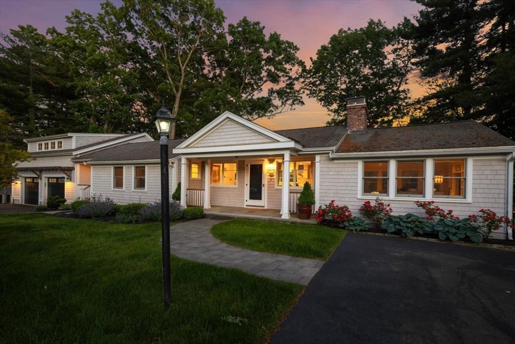 25 Howland Lane Hingham, MA 02043 - Photo 14 of 34 a front view of a house with a yard