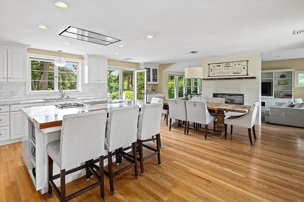 25 Howland Lane Hingham, MA 02043 - Photo 15 of 34 a view of a dining room with furniture window and outside view