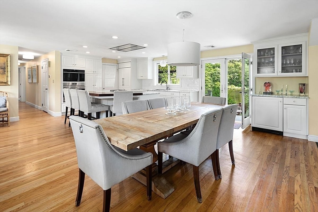 25 Howland Lane Hingham, MA 02043 - Photo 18 of 34 a view of a dining room with furniture and wooden floor