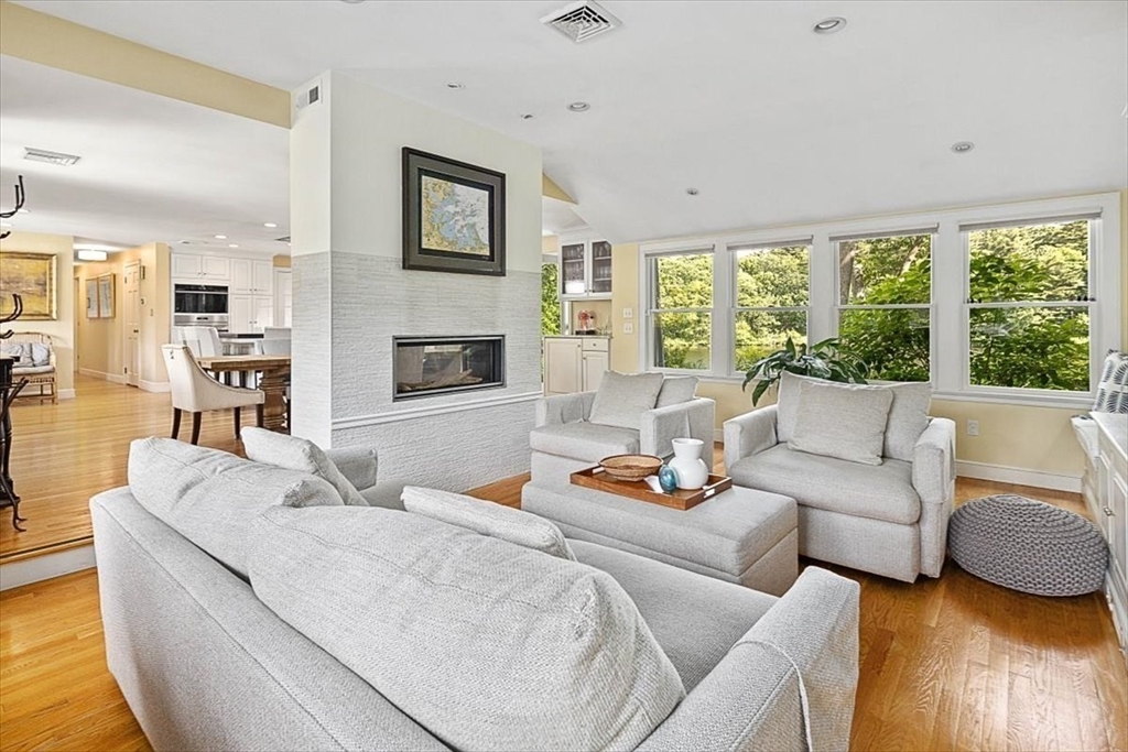25 Howland Lane Hingham, MA 02043 - Photo 19 of 34 a living room with furniture and a large window