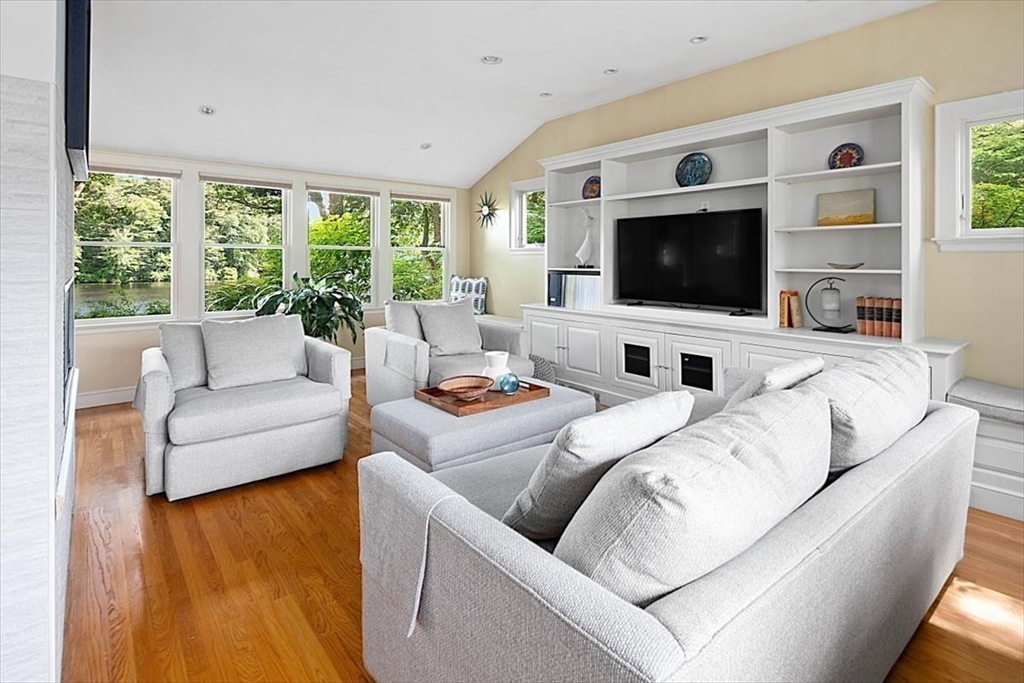 25 Howland Lane Hingham, MA 02043 - Photo 20 of 34 a living room with furniture and a flat screen tv