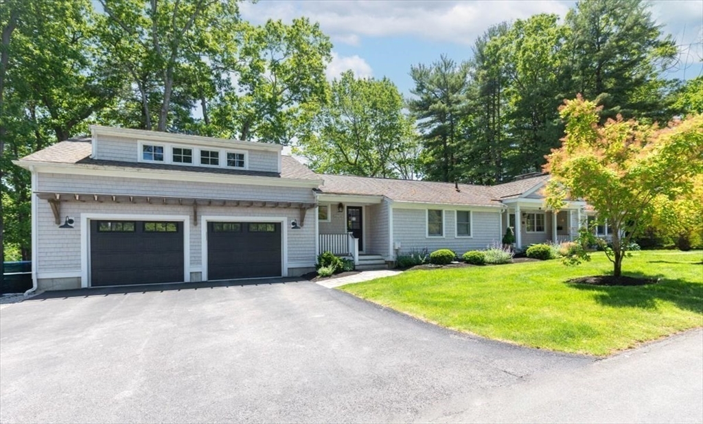 25 Howland Lane Hingham, MA 02043 - Photo 2 of 34 a view of a house with a yard and large tree